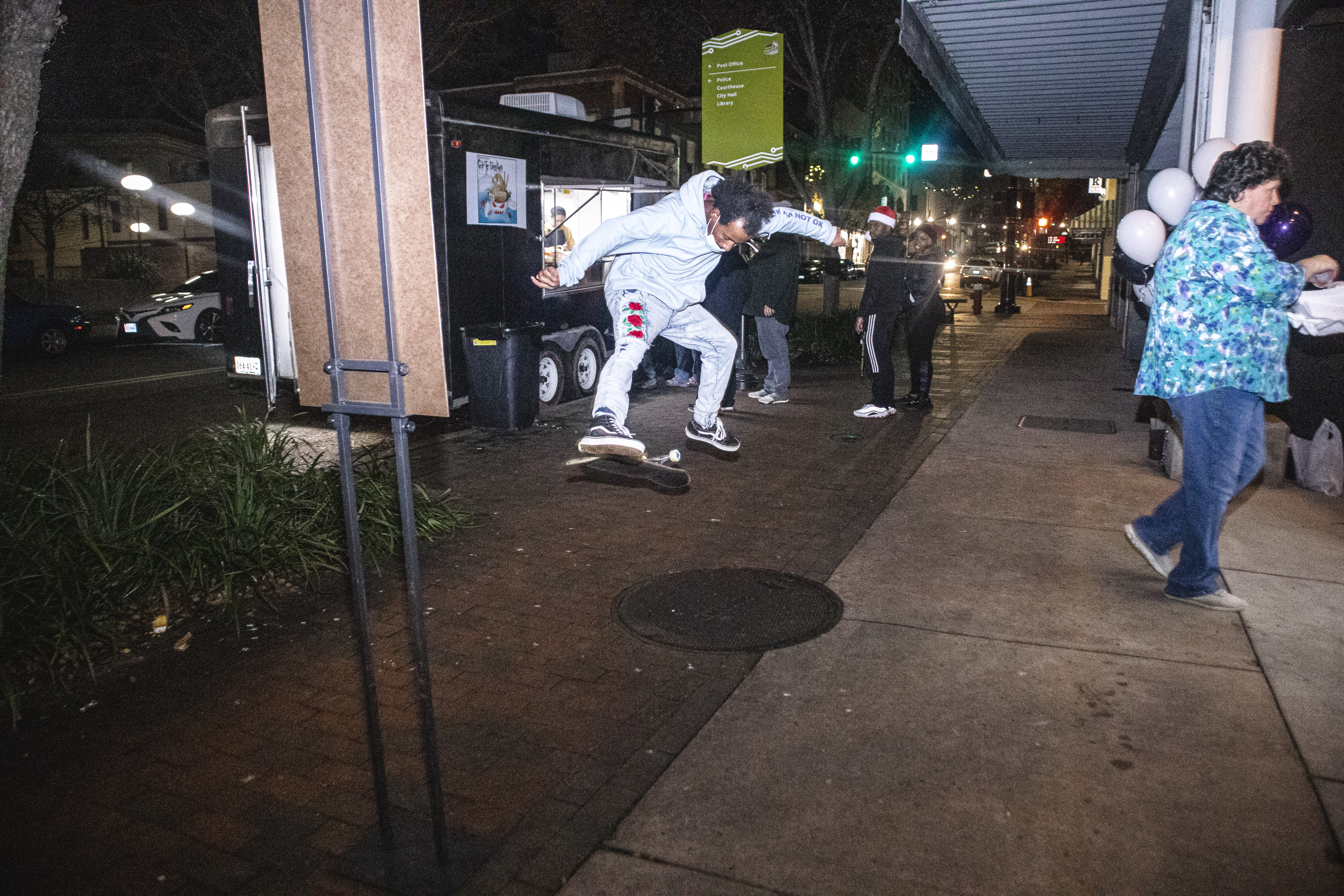 Skateboarding outside SPARX Board Co. store